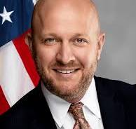 Thomas J. Nessler with the American flag